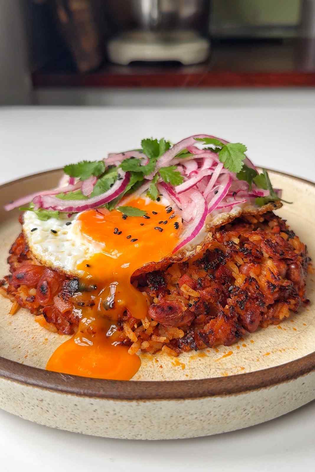 Peruvian rice and beans with an egg on top.